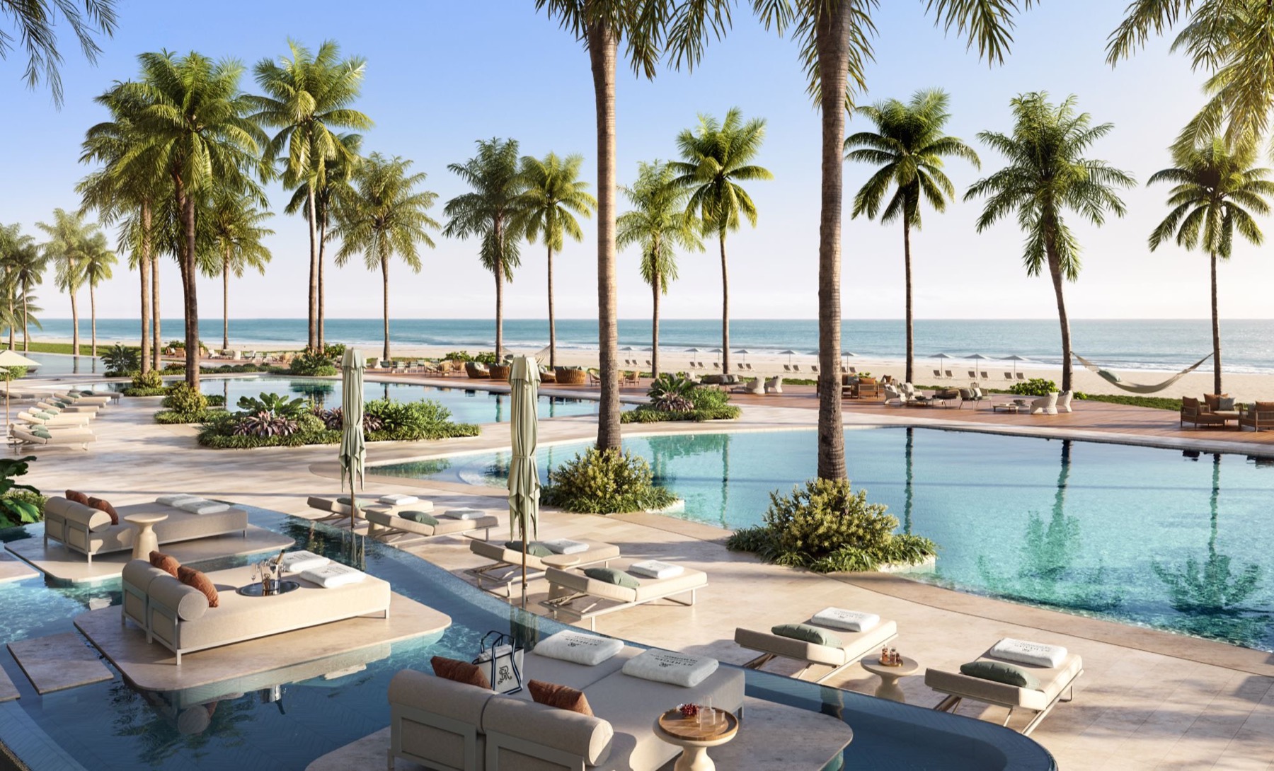 Beachfront pool deck at The St. Regis Residences